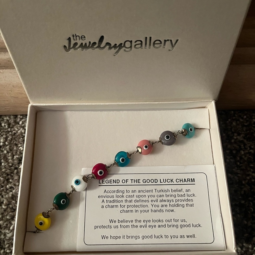 Evil Eye Multicolored Bracelet sterling silver with claw clasp.  New in box.